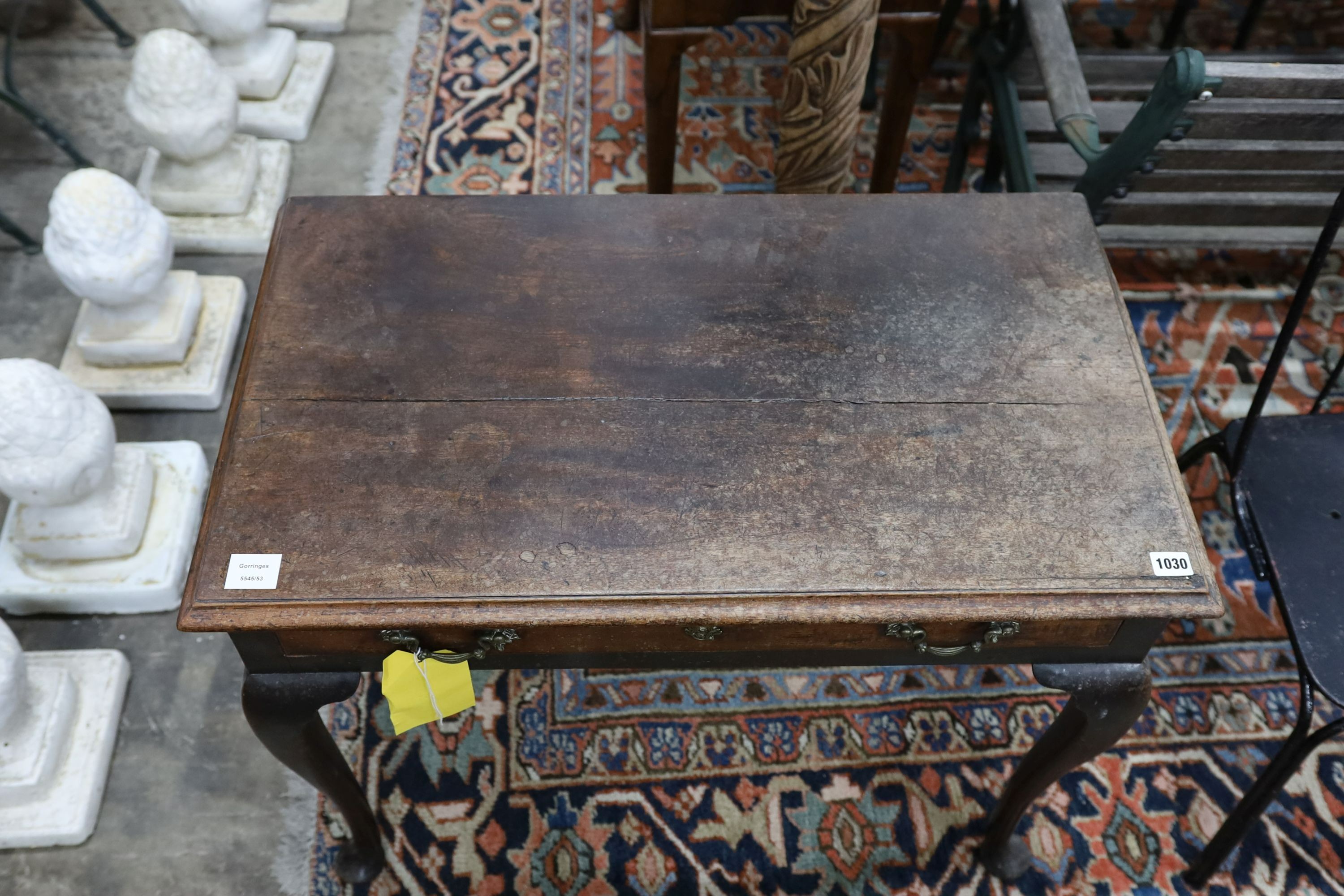 A George III mahogany side table, fitted with a single drawer, on cabriole legs, width 83cm, depth 48cm, height 67cm